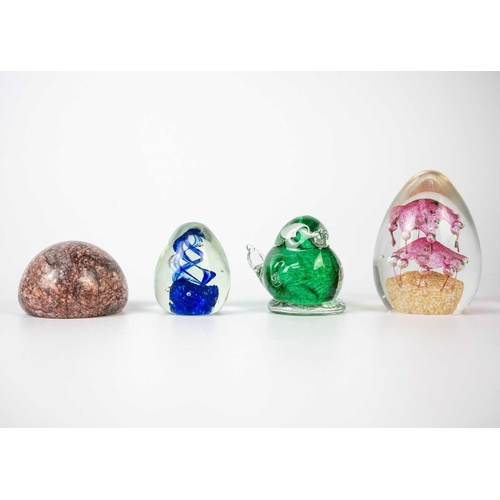 384 - A collection of glass paper weights. Together with other glass items.