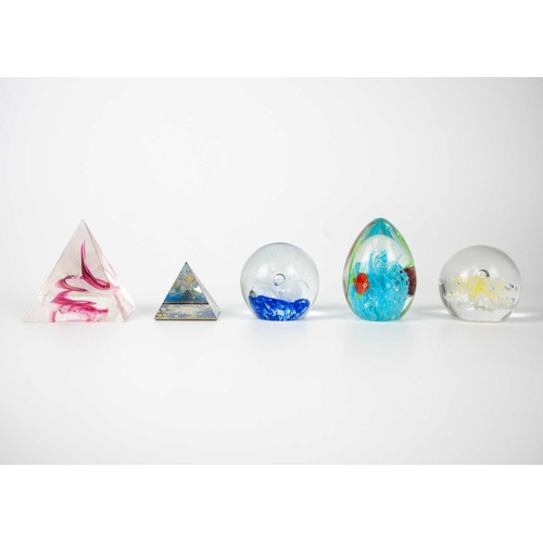 384 - A collection of glass paper weights. Together with other glass items.