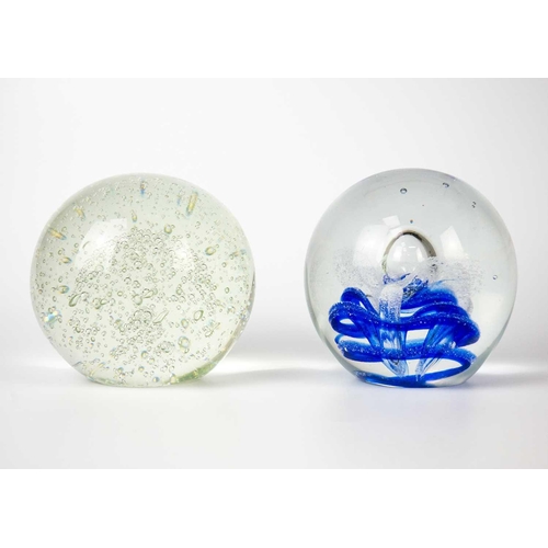 385 - Two large glass paper weights. Diameter 14cm, together with glass vase and other glass items.