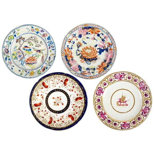 386 - A 19th century armorial plate. The centre painted with a dragon passant, within borders decorated wi... 