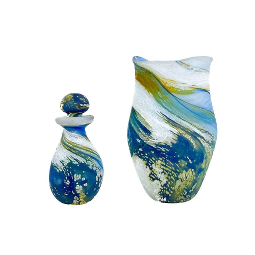 387 - A Lesley Clarke vase. Height 16cm; together with a perfume bottle and two paper weights by the same ... 