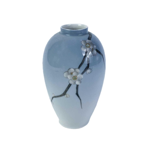 389 - A Royal Copenhagen vase. With flower and dragonfly painted decoration, height 14cm; together with a ... 