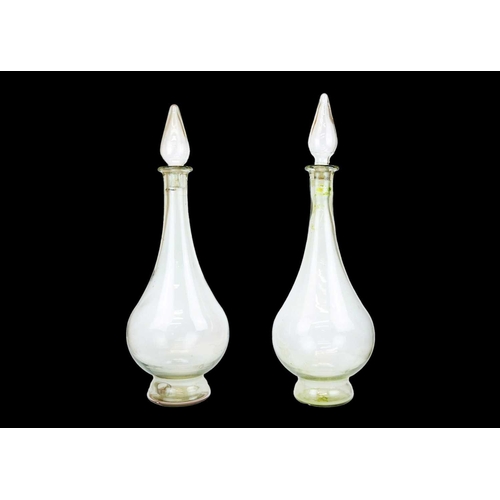 398 - A pair of large modern apothecary display glass decanters and stoppers. Height 80cm.