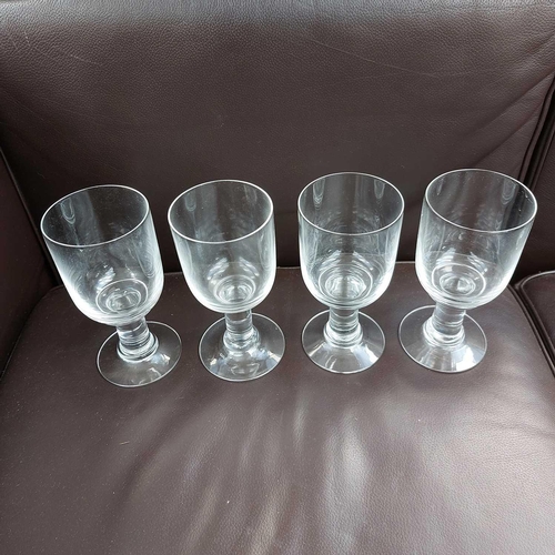 405 - A set of eight glass rummers. Height 15.5cm. (8) One glass has a tiny chip to rim, otherwise no cond... 