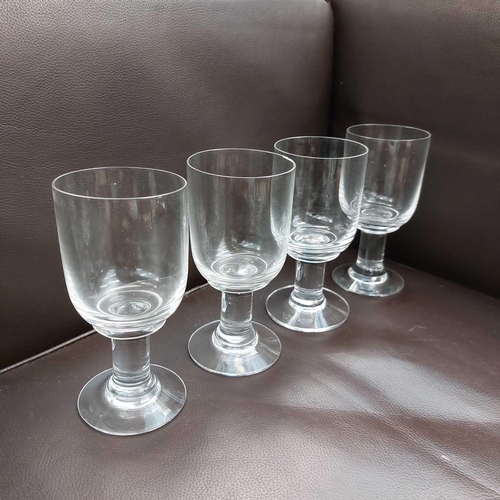 405 - A set of eight glass rummers. Height 15.5cm. (8) One glass has a tiny chip to rim, otherwise no cond... 