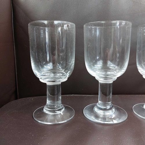 405 - A set of eight glass rummers. Height 15.5cm. (8) One glass has a tiny chip to rim, otherwise no cond... 
