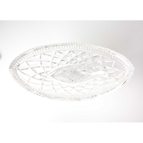 406 - A fine cut glass centre piece on gilt metal stand. Diameter 28.5cm together with a cut glass boat sh... 