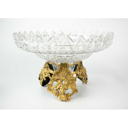 406 - A fine cut glass centre piece on gilt metal stand. Diameter 28.5cm together with a cut glass boat sh... 