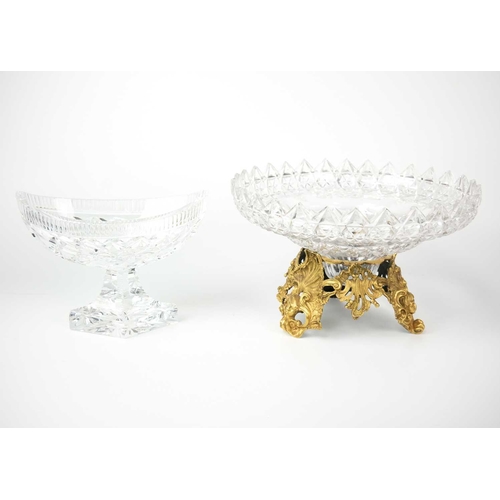 406 - A fine cut glass centre piece on gilt metal stand. Diameter 28.5cm together with a cut glass boat sh... 