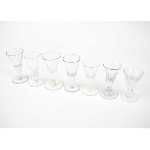 407 - A late 18th century wrythen ale glass. Height 13cm together with seventeen various 18th century and ... 