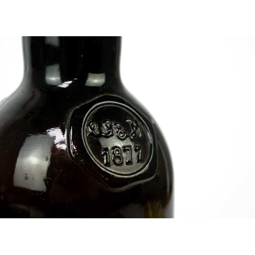 411 - A green glass magnum wine bottle, circa 1820. With kick-up base, height 35cm, another similar magnum... 