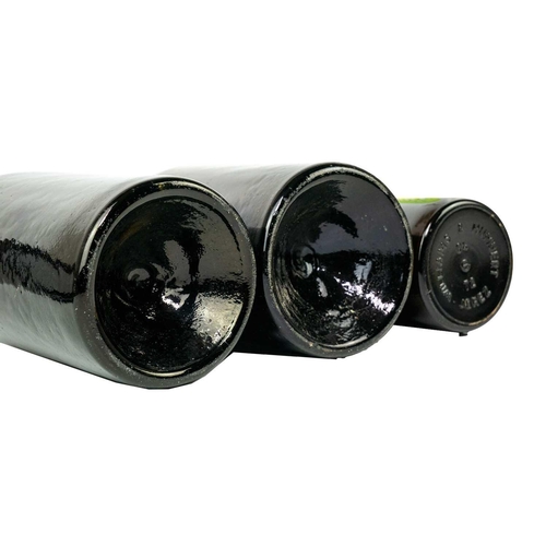 411 - A green glass magnum wine bottle, circa 1820. With kick-up base, height 35cm, another similar magnum... 