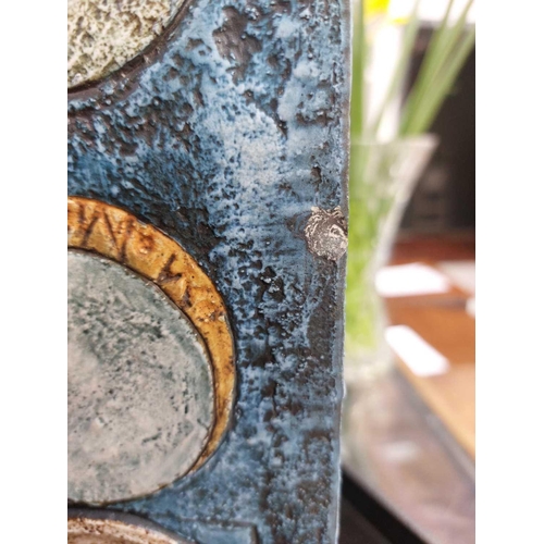 42 - A large Troika square section vase. Decorated by Eleanor Winning, with incised circles, cogs and geo... 