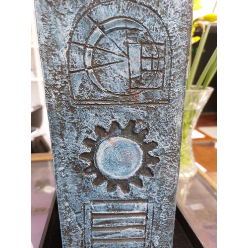42 - A large Troika square section vase. Decorated by Eleanor Winning, with incised circles, cogs and geo... 