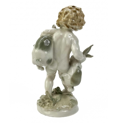 480 - Karl Tutter for Hutschenreuther porcelain figure. Modelled as a young boy with two rabbits. impresse... 