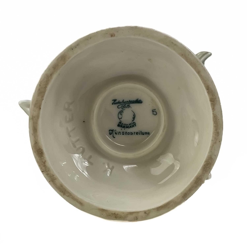 480 - Karl Tutter for Hutschenreuther porcelain figure. Modelled as a young boy with two rabbits. impresse... 