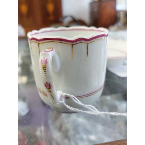 481 - A Meissen porcelain cup. Circa 1780, with a wishbone handle and floral painted decoration, crossed s... 