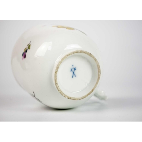 481 - A Meissen porcelain cup. Circa 1780, with a wishbone handle and floral painted decoration, crossed s... 