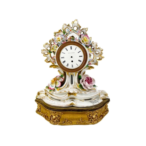 482 - A French porcelain Jacob Petit style clock. With a watch movement by Thomas Woodward Gosport, height... 