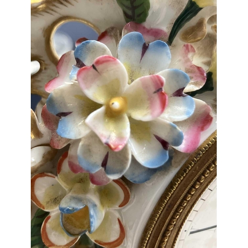 482 - A French porcelain Jacob Petit style clock. With a watch movement by Thomas Woodward Gosport, height... 