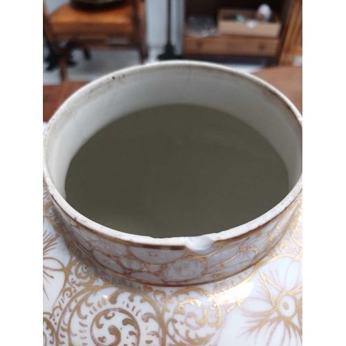 483 - A pair of German porcelain baluster vases and covers. Decorated on blue ground with panels of courti... 