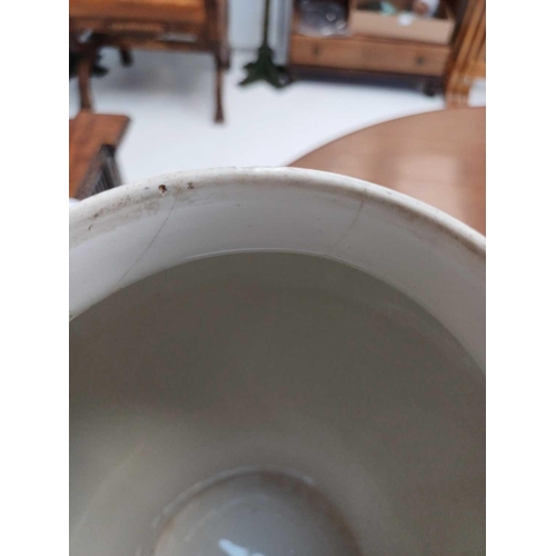 483 - A pair of German porcelain baluster vases and covers. Decorated on blue ground with panels of courti... 