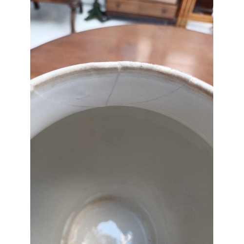 483 - A pair of German porcelain baluster vases and covers. Decorated on blue ground with panels of courti... 