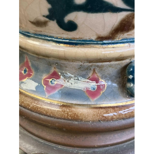 484 - Zsolnay Pecs (attributed), a Hungarian porcelain oil lamp base. With Islamic style painted decoratio... 