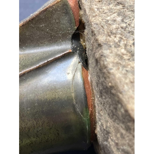 486 - Humfrey Wakefield - A pottery cormorant on stone stand. With HW seal mark. Height 39cm. Together wit... 