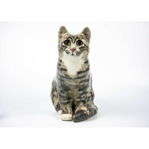 488 - A Winstanley pottery tabby cat. Height 28cm. Together with a Brunido pottery cat and five other smal... 