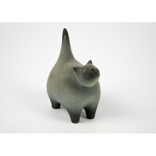 491 - A Tony White cat ceramic figurine. Height 27cm. Together with a pin cushion metal cat figurine and t... 