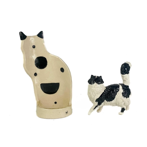 492 - A P Rada pottery floral cat figurine. Height 14cm. Together with four other ceramic and pottery cat ... 