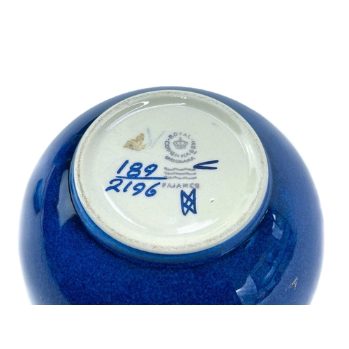 493 - A Royal Copenhagen 'Fajance' ceramic bottle with stopper. Height 13cm, together with a similar Royal... 