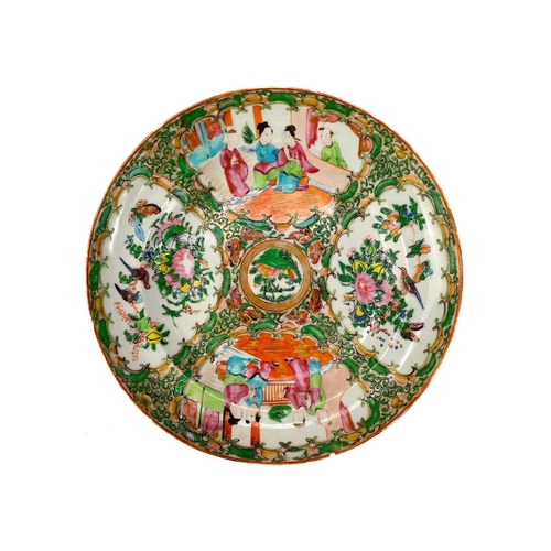 497 - A Canton porcelain plate. Painted in the Famille Rose palette, diameter 25cm, together with a tube-l... 