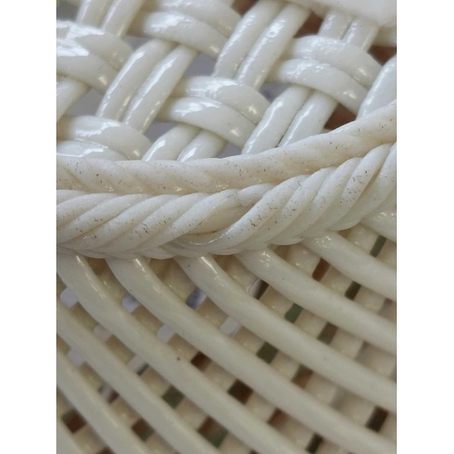 498 - A late 19th century Belleek Pottery two strand woven basket. Impressed marks to base, diameter 15.5c... 