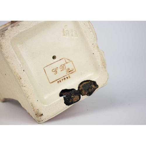 499 - A pair of late 19th/early 20th century continental pottery figures of seated ladies holding fans. He... 