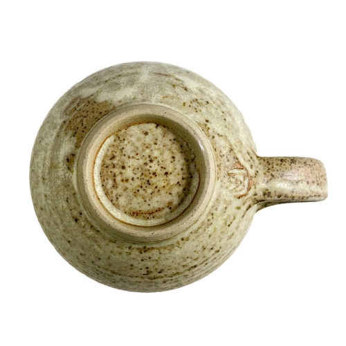 507 - A Studio pottery teaset. Comprising six cups and saucers, a sugar bowl, and a milk jug, together wit... 