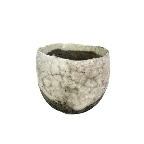 510 - Delan COOKSON (1937) A ceramic squat vase with incised mark. Height 9.5cm. Together with other studi... 