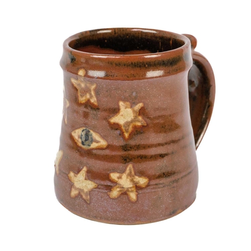 511 - Trevor Corser, a Leach pottery mug. Decorated with star motifs, impressed seal marks, height 12cm, t... 