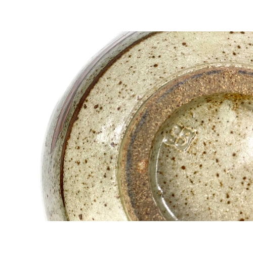 515 - A Leach pottery Z bowl. With mottled interior and typical painted stylised decoration, impressed sea... 