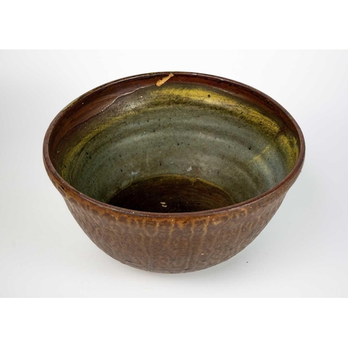 517 - A studio pottery deep bowl. Diameter 23cm together with six other various studio pottery items. (7)