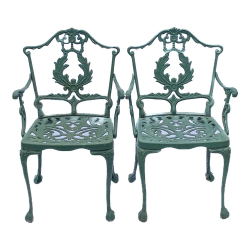 518 - A green painted metal bistro set. Comprising a circular table, height 68.5cm, diameter 80cm, and fou... 