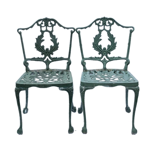 518 - A green painted metal bistro set. Comprising a circular table, height 68.5cm, diameter 80cm, and fou... 