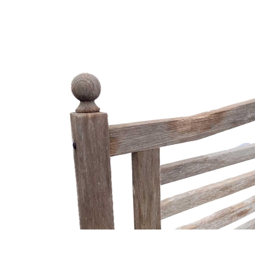 520 - A garden bench with ball finials. Height 97.5cm, width 121cm, depth 47cm.