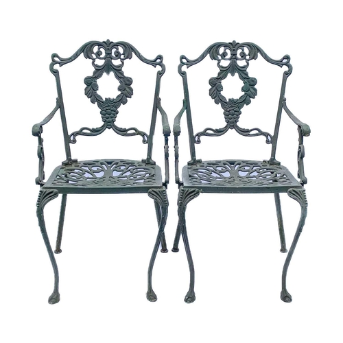 522 - A green painted metal bistro set. Comprising a circular table, height 68.5cm, diameter 80cm, and fou... 
