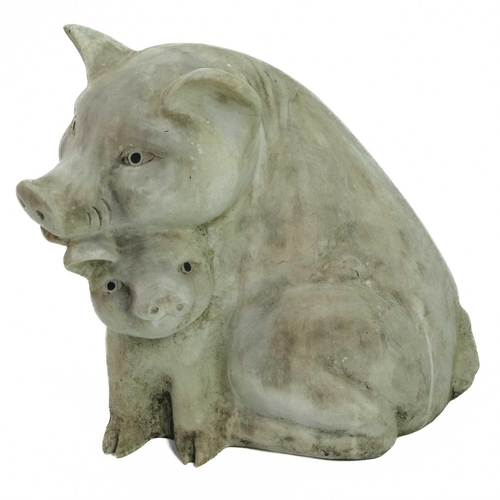 526 - A reconstituted stone group of pigs. Height 41cm, width 37cm, depth 45cm.