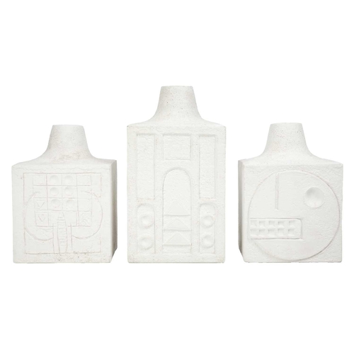 53 - A Troika biscuit pottery table lamp base. Height 24cm together with two Troika biscuit pottery cube ... 