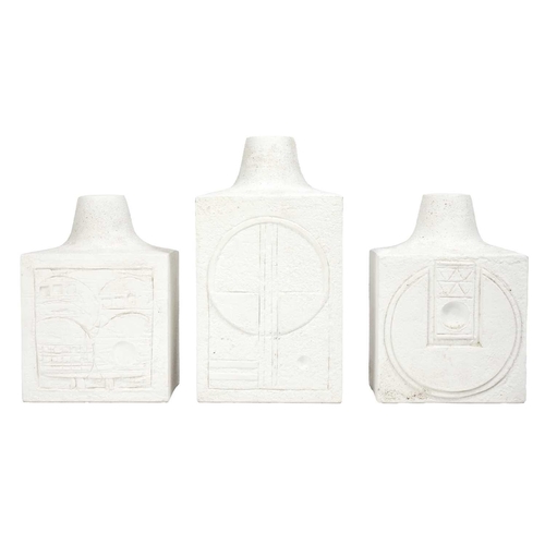 53 - A Troika biscuit pottery table lamp base. Height 24cm together with two Troika biscuit pottery cube ... 