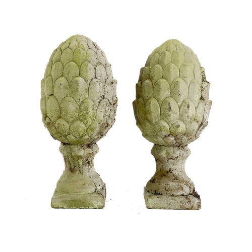 535 - A pair of reconstituted stone artichoke finials. Height 29.5cm.