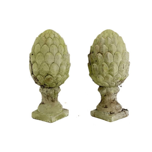 535 - A pair of reconstituted stone artichoke finials. Height 29.5cm.